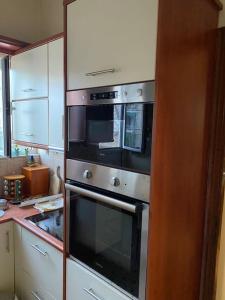 Η κουζίνα ή μικρή κουζίνα στο House close to the port Piraeus and metro station