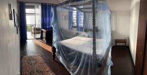 Ένα ή περισσότερα κρεβάτια σε δωμάτιο στο Beach Villa Yang near Hikkaduwa, with Pool and Cook - Semi-detached House