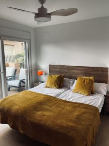 En eller flere senge i et værelse på Appartement La Casa Soleada Mar Menor Golf & Padel Resort