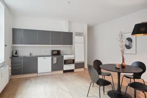 Η κουζίνα ή μικρή κουζίνα στο Luksus Bolig til 6 Personer i Hjertet af Aarhus
