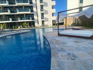 A piscina localizada em Makia Beach by Essence - Muro Alto, Porto de Galinhas ou nos arredores