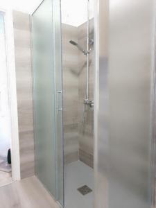 a shower with a glass door in a bathroom at villa gesualda in Bagno di Romagna +17 photos