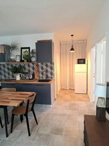 Kuchyň nebo kuchyňský kout v ubytování Apartman matusan palit55