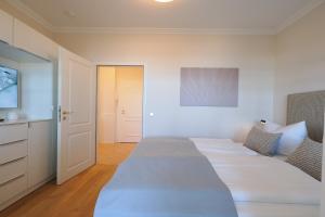 Ein Bett oder Betten in einem Zimmer der Unterkunft Seehof Seehof 24