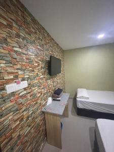 TV a/nebo společenská místnost v ubytování Hotel Global Subang