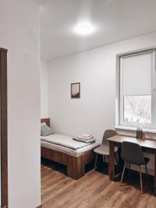 Hotel Dovha客房内的一张或多张床位