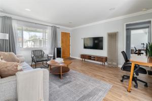 a living room with a couch and a table at Mountain View 1br nr shops groceries tech hub SFO-1522 in Mountain View