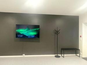 TV a/nebo společenská místnost v ubytování SamiCity Hotel As