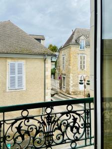 a view from a balcony of a building at LE BERCHON classé trois épis in Nay