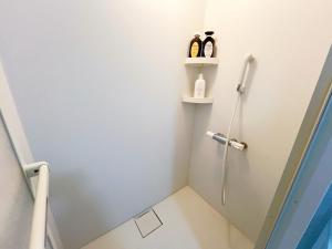 Koupelna v ubytování 池袋2分5人可