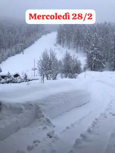 a pile of snow on a snow covered road at Sestriere Borgata appartamento in montagna Casa di Bertu in Borgata Sestriere