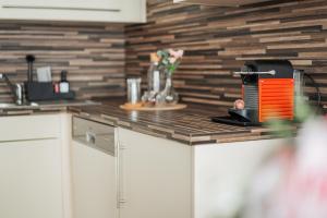 Kuchyňa alebo kuchynka v ubytovaní Serviced Apartments Josefstadt City