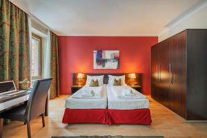 Posteľ alebo postele v izbe v ubytovaní Serviced Apartments Josefstadt City