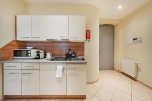 Kuchyňa alebo kuchynka v ubytovaní Serviced Apartments Josefstadt City