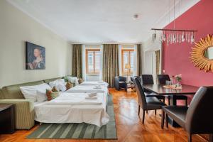 Posteľ alebo postele v izbe v ubytovaní Serviced Apartments Josefstadt City