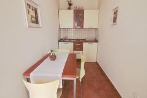 Kuchyň nebo kuchyňský kout v ubytování Studios & Rooms Fiesta
