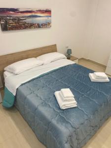 Ein Bett oder Betten in einem Zimmer der Unterkunft MAKI HOME