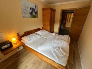 Posteľ alebo postele v izbe v ubytovaní Alpenlodge, Ferienwohnung 3