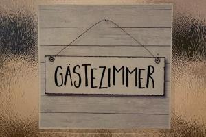 a sign hanging on a wall with the word semester at Private Room with own bathroom in Hannover