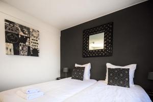Postel nebo postele na pokoji v ubytování Hotel Berg en Bos