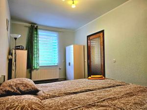 Säng eller sängar i ett rum på Apartment Hotel Rubini