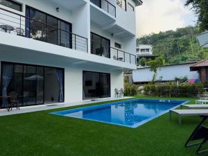 an image of a house with a swimming pool at New above Chaweng - Inkl Scooter in Amphoe Koksamui