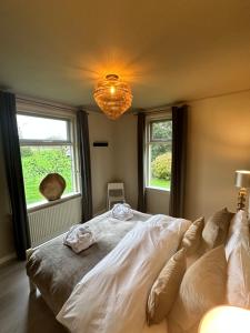 Postel nebo postele na pokoji v ubytování B&B Borgersteeg
