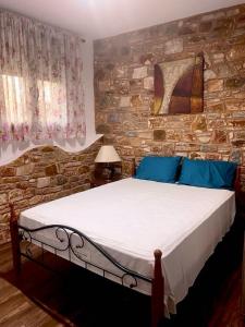 Postel nebo postele na pokoji v ubytování Villa Aggeliki