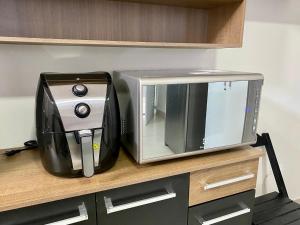 Dapur atau dapur kecil di Casa bem Equipada 3 quartos