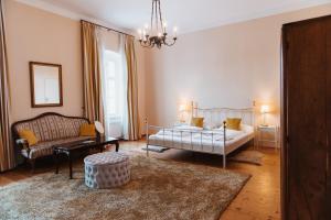 Postel nebo postele na pokoji v ubytování Schloss Gamlitz