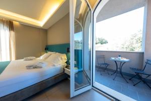 Postel nebo postele na pokoji v ubytování Airone City Hotel