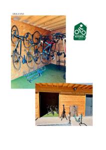 a gym with bikes hanging on the wall at Le Domaine d'Arignac - La grande maison in Arignac