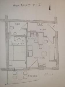 a drawing of a floor plan of a house at Ferienwohnung 21 in Müritz