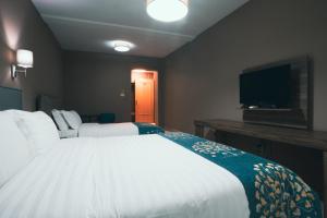 Postel nebo postele na pokoji v ubytování Hotel Eder