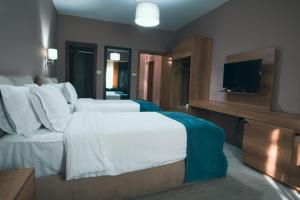 Postel nebo postele na pokoji v ubytování Hotel Eder