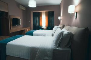 Postel nebo postele na pokoji v ubytování Hotel Eder