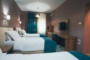 Postel nebo postele na pokoji v ubytování Hotel Eder