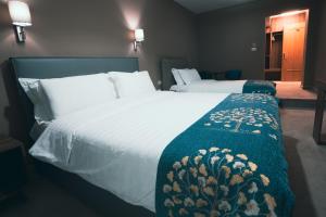 Postel nebo postele na pokoji v ubytování Hotel Eder