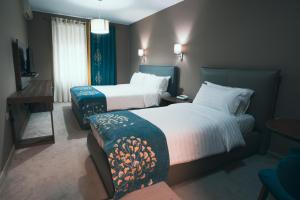 Postel nebo postele na pokoji v ubytování Hotel Eder