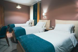 Postel nebo postele na pokoji v ubytování Hotel Eder