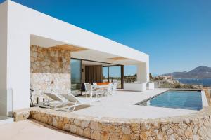 an image of a villa with a swimming pool at Villa Mare Monti in Calvi
