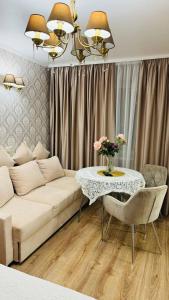 Ruang duduk di Apartment Near The Aquapark