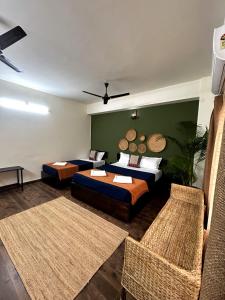 Postel nebo postele na pokoji v ubytování Peepal Tree Inn