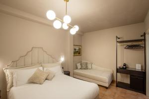Cama ou camas em um quarto em Daplace - Antica Casa Coppo