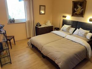 Ένα ή περισσότερα κρεβάτια σε δωμάτιο στο Haus Königswald