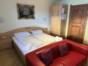 Posteľ alebo postele v izbe v ubytovaní Alpenlodge, Ferienwohnung 19