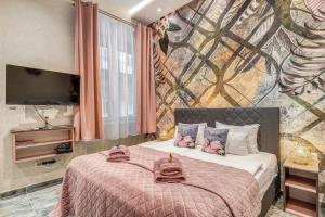 En eller flere senge i et værelse på Budapest Magic Exotic in Downtown