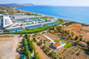 an aerial view of a resort next to the ocean at Kalimera Villa By the Sea in Gennadi