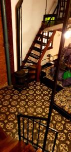 une chambre avec un escalier et une chambre avec un étage dans l'établissement COMO EN CASA en Buenos Aires, à Buenos Aires