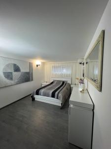 Llit o llits en una habitació de Skalvija Apartment Dreverna